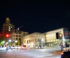 Artwork projected onto a monument and building.