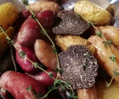A restaurant dish of potatoes and truffles.