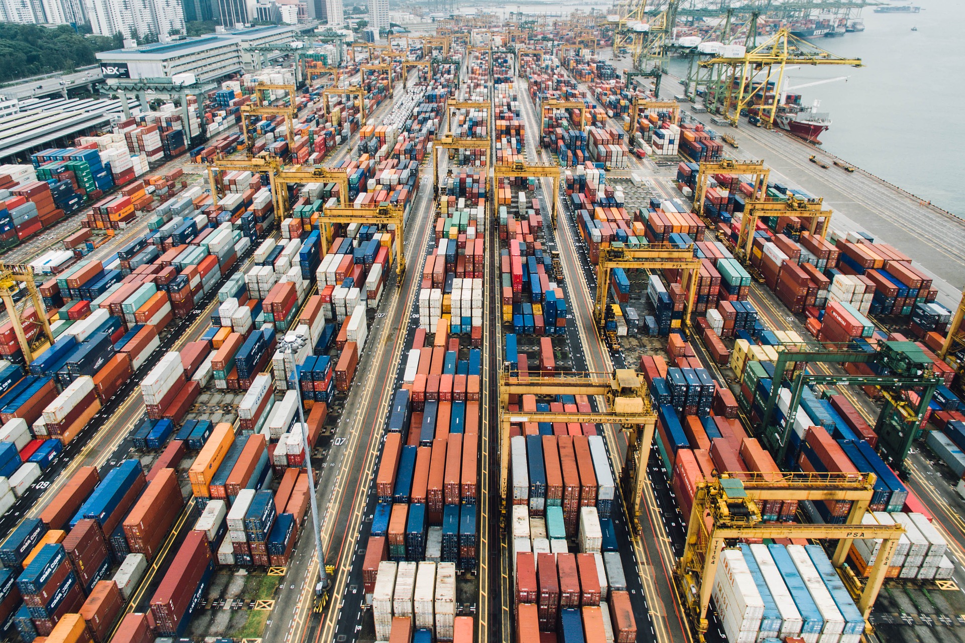 A shipping yard full of containers awaiting export.